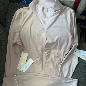 Love Tree 2 piece Light Pink Zip-Up Jacket and Long Flare Pants.